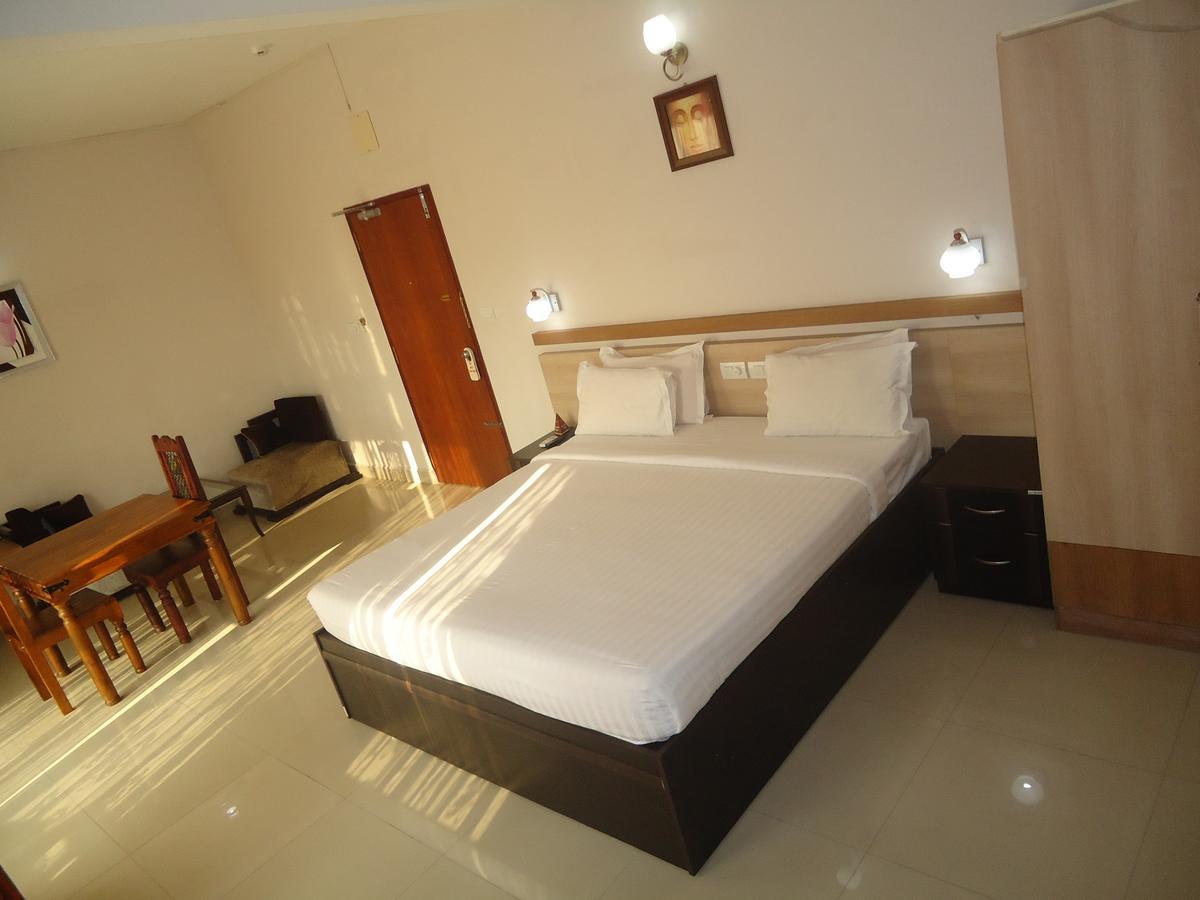Hotel Polariz Parassinikkadavu Quarto foto